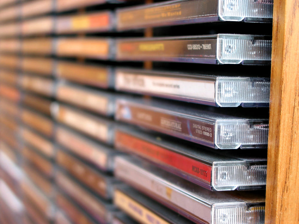     Closeup of a shelf showing stacks of music albums 